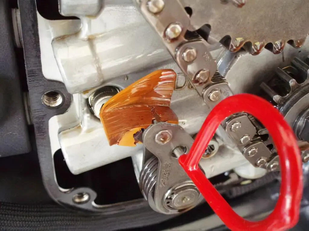 Here's an example of a worn cam chain tensioner on an Electra Glide.