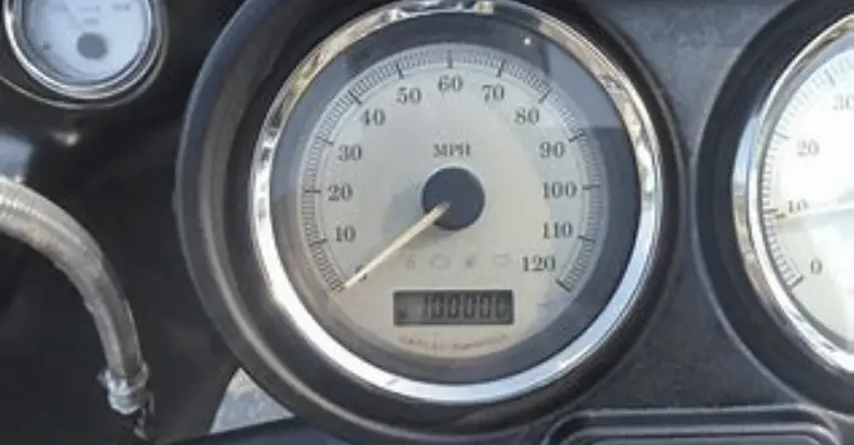 Here's a picture of my harley davidson odometer with 100,000 miles.