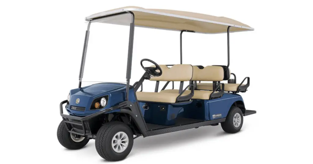 Here's a Cushman Shuttle 6 in dark blue with khaki seats and extended roof.