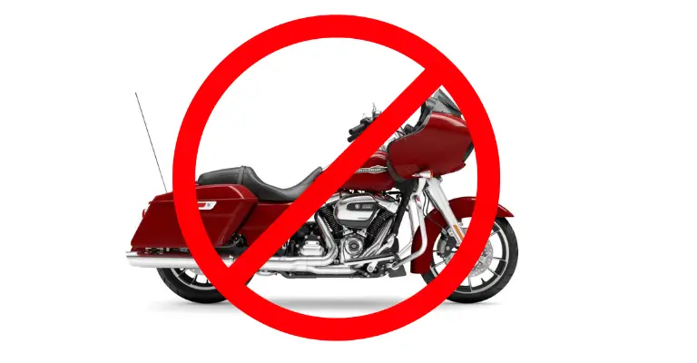 This is a picture of a '23 Harley Davidson Road Glide, with a "no sign" across it. This is used to illustrate that there are certain Road Glide years that should be avoided.