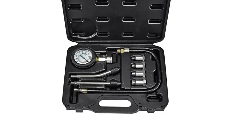 This is a picture of a compression test kit. It is one of many methods to diagnose a motorcycle that has white smoke coming from its exhaust.
