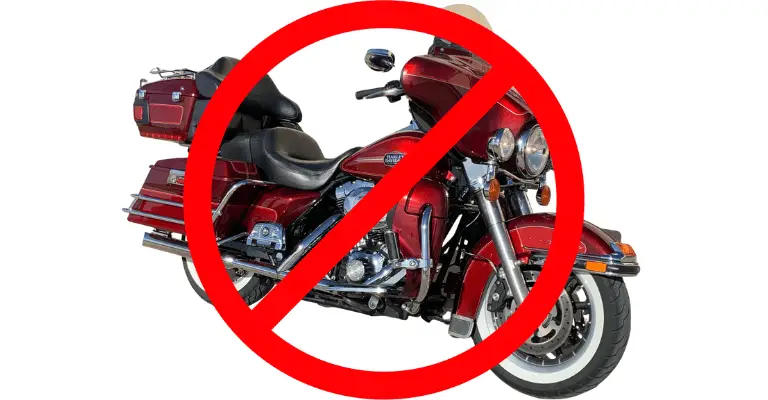 This is a picture of an Electra Glide Ultra Limited. It has a "no sign" overlayed onto it, to demonstrate there are certain Electra Glide years to avoid.