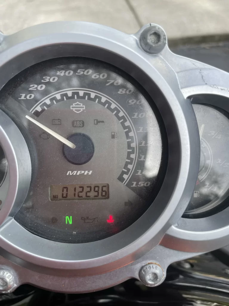 This is a picture of the overheating light found on Harley Davidson instrument clusters.