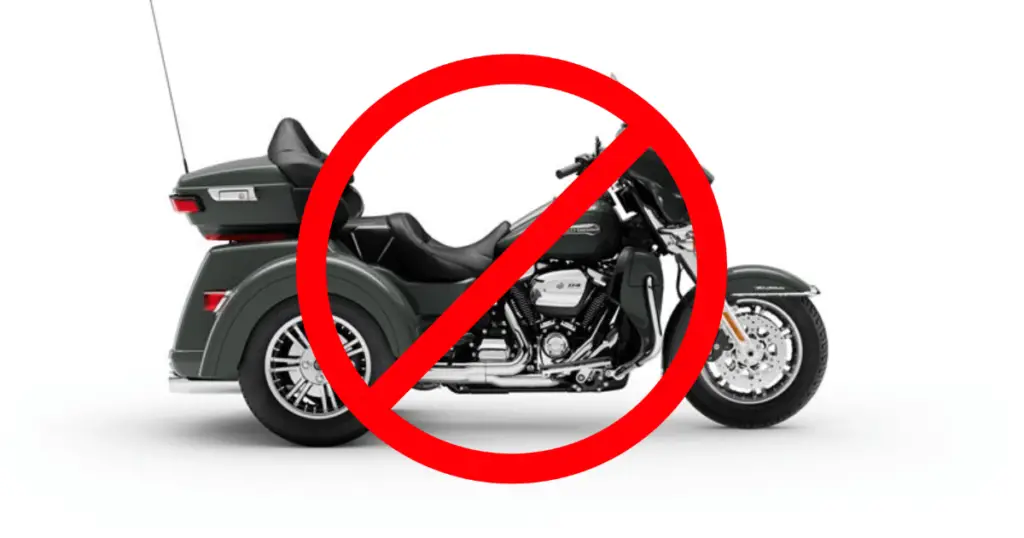 This is an image of a Harley Tri Glide with a "no-sign" overlayed on top of it. It is used to illustrate there are common Harley Tri Glide problems to be aware of.