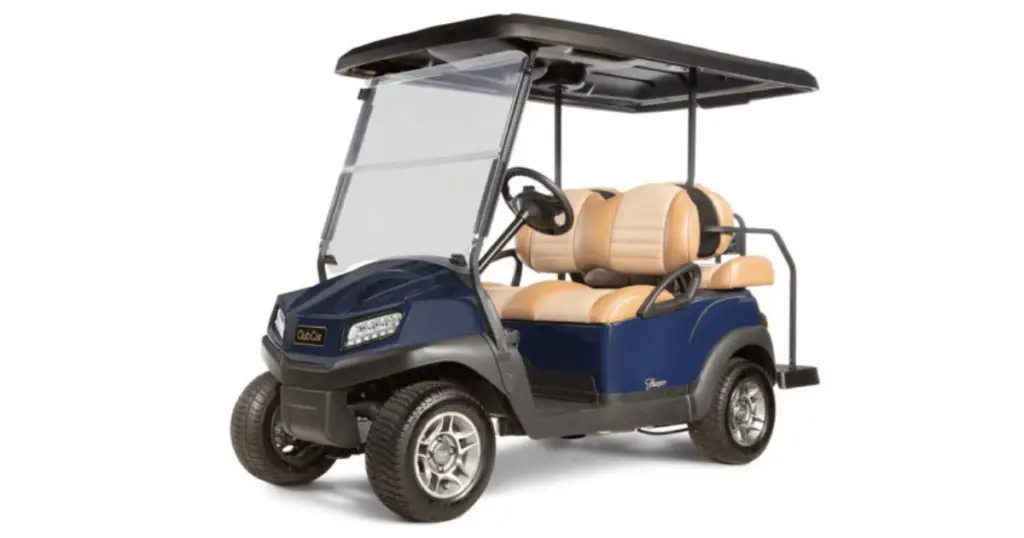 Example of a blue Club Car tempo with tan custom seats and a long black roof