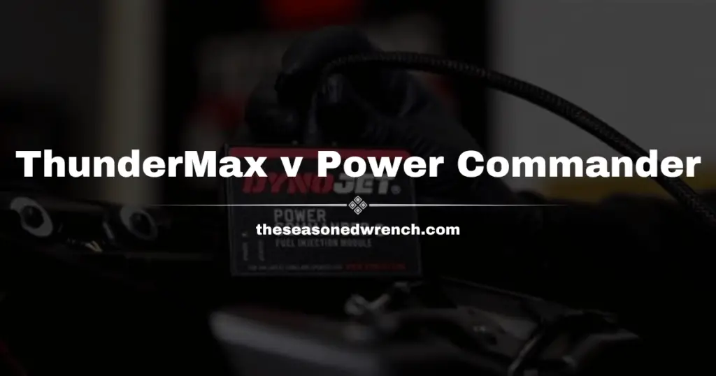 Exampel of the Power Commander installed on a motorcycle with a gloved hand in the background, used to offer a visual comparison to the ThunderMax tuner