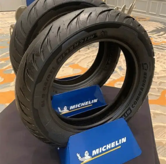 Two Michelin Commander 3s in a Michelin stand on display